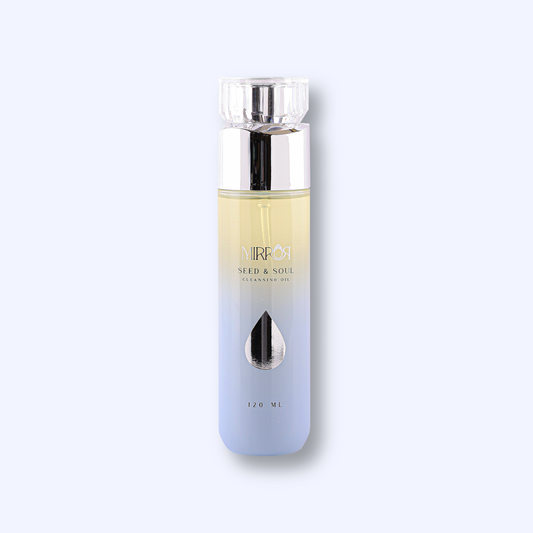 Mirror Skin Seed & Soul nourishing cleansing oil bottle on pastel background.